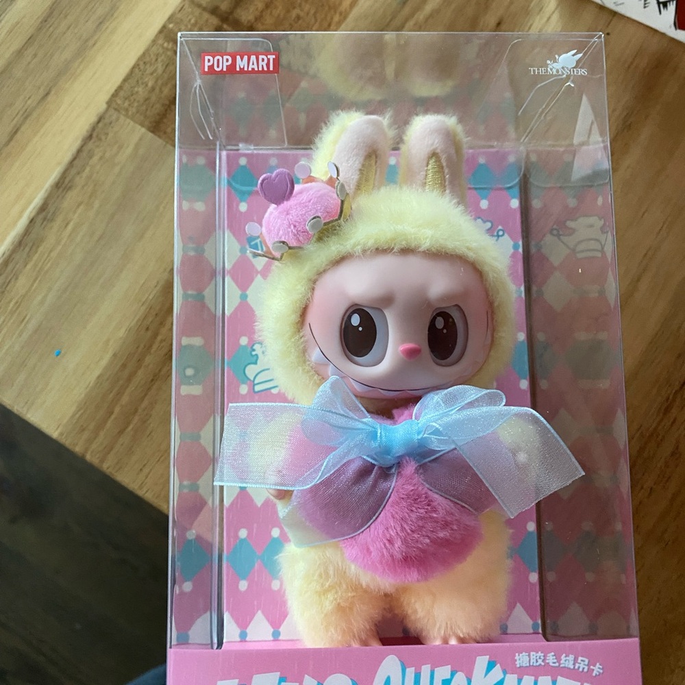 Yellow and Pink Action Figure